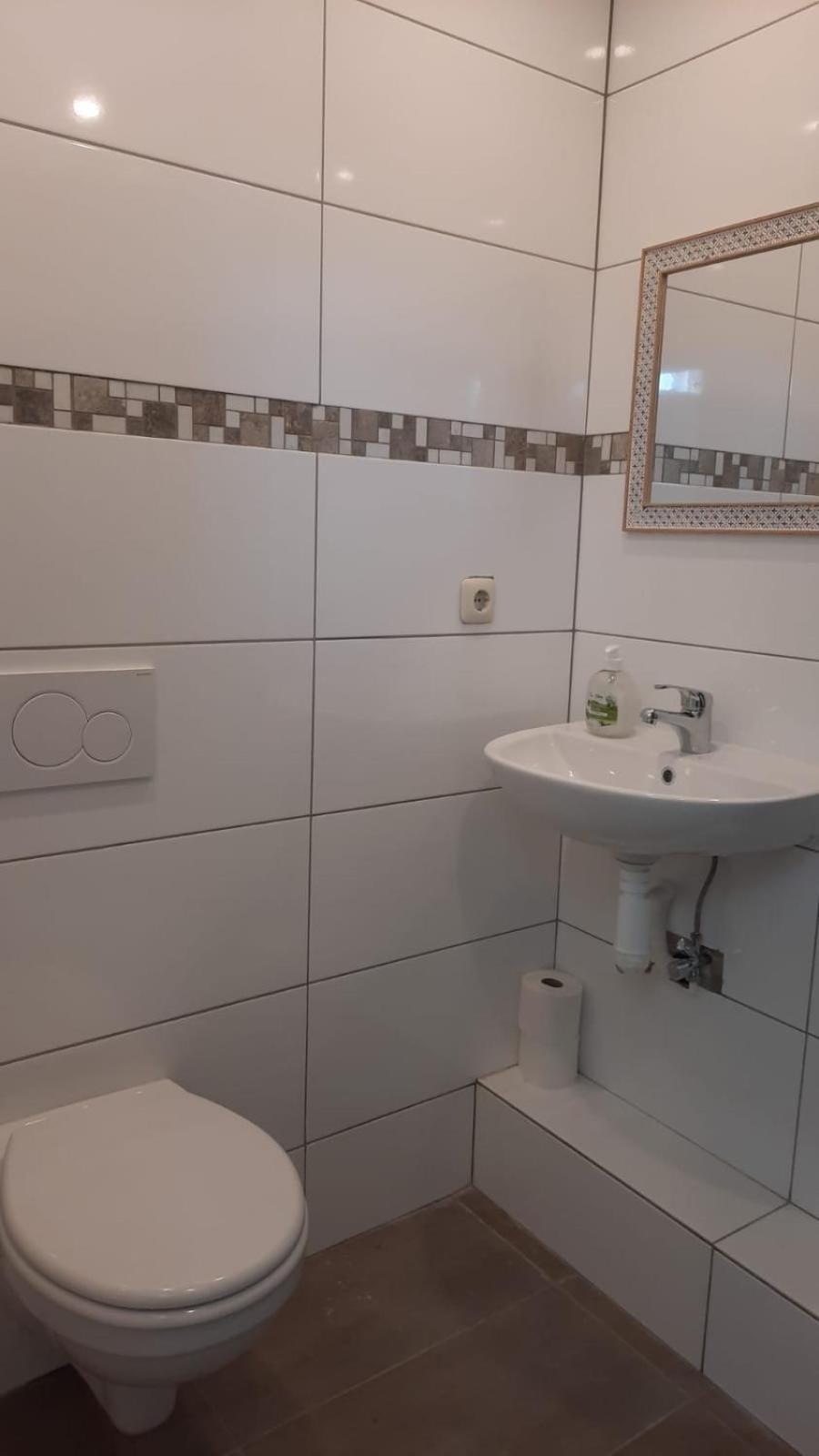 Ferienwohnung Mittelpunkt Schortens Buitenkant foto